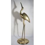 Echassier en bronze. Socle en laiton. Haut. 96 cm. -