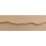 Collier de perles de 9mm nouées. Long : 60 cm. -