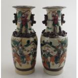 Chine. Paire de vases en porcelaine de Nankin. Haut. 24.5 cm. -
