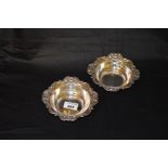 A Pair of Embossed Solid Silver Dishes