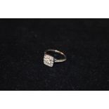 A Platinum Solitaire Diamond Ring 0.85ct with Diamond Set Shoulders