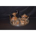 A Four Piece Silver Plate Tea Service on Gallery Tray