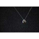 A 9ct Gold Diamond Heart Pendant