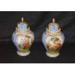 A Pair of Lidded Urns with Neoclassical Scenes