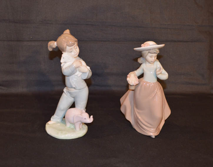 Two Nao Figurines 'Girl With Lamb' and 'Girl With Flower Basket'