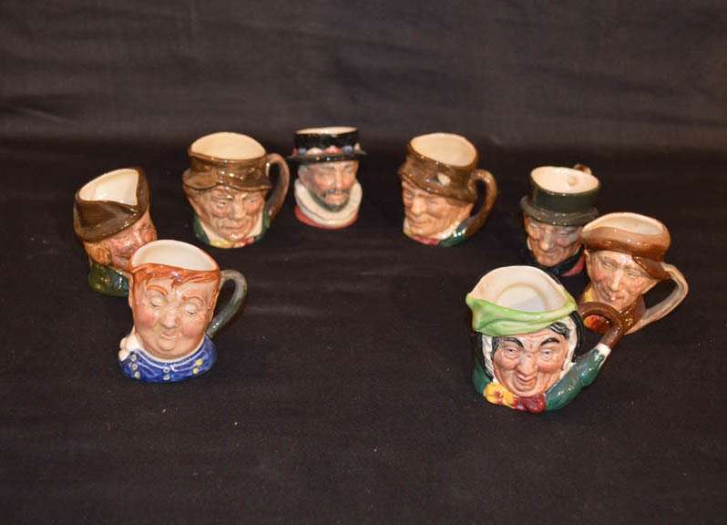 An Interesting Collection of 8 Royal Doulton Character Jugs