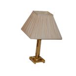 A Brass Table Lamp and Shade