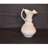 A Similar Belleek Flower Encrusted Jug