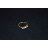 An 18ct Gold and Platinum Five Diamond Ring