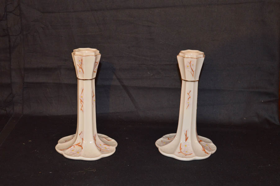 A Pair of Belleek Candlesticks