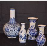 A Large Blue and White Vase and Three Others