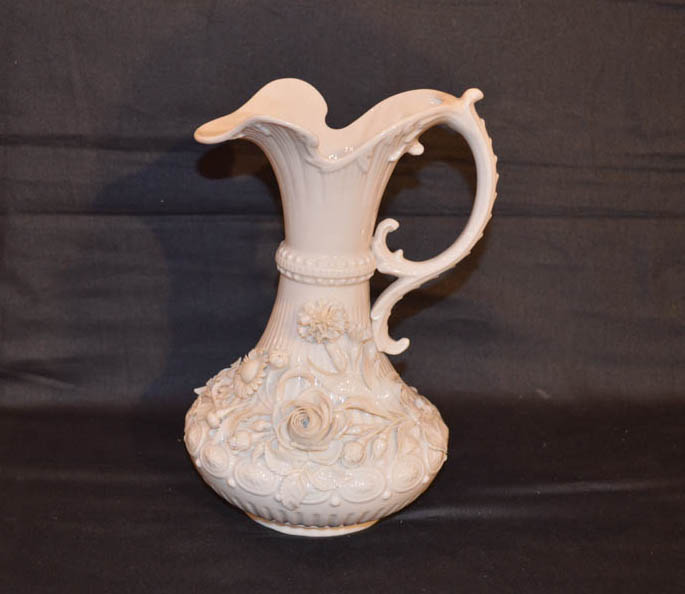 A Second Period Belleek Flower Encrusted jug