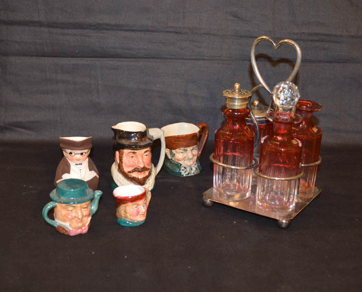 A Ruby and Crystal Vinaigrette and a Collection of Minature Character Jugs