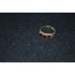 A 9ct Gold Three Garnet Ring