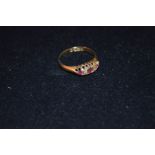 An 18ct Ruby and Diamond 5 Stone Ring, Chester 1916