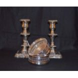 A Pair of Silver Plated Candlesticks and a Pair of Silver Plated Coasters