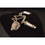 A Very Nice SIlver Whistle and Chain together with Lion Mask Holder