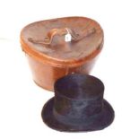 A Gents Top Hat, in its Leather Case