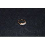 A 9ct Gold Ring with Two Rows of Gem Stones