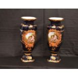 A Pair of Tall Decorated and Gilted Vases