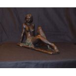 A Bronzed Figurine 'Lady Reclining' - Signed