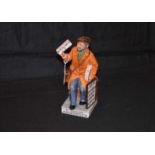 A Royal Doulton Figurine 'The News Vendor'