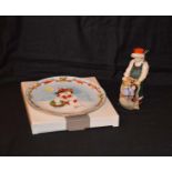A Royal Doulton Figurine 'Santas Helper' and a Royal Doulton 'Mrs Frostys Christmas' Plate