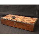 An Antique Wooden Chess Board and a Box of Boxwood Draughts