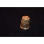 A 14ct Gold Thimble