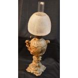 An Unusual and Gilted Metal Figurine Based Oil Lamp Etched Shade