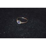 A Platinum Tazanite and Diamond Ring