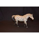 A Beswick Figurine 'Appaloosa Spotted Walking Pony'