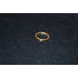 A 9ct Gold and Diamond Wedding Band