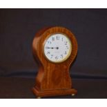 An Inlaid Mahogany French Clock