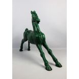 Paul MILET (1870-1950). - Cheval en céramique émaillée verte. - Signé au [...]