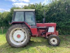 RED INTERNATIONAL HARVESTER 784 DIESEL TRACTOR WITH FULL GLASS CAB, RUNS AND WORKS *PLUS VAT*