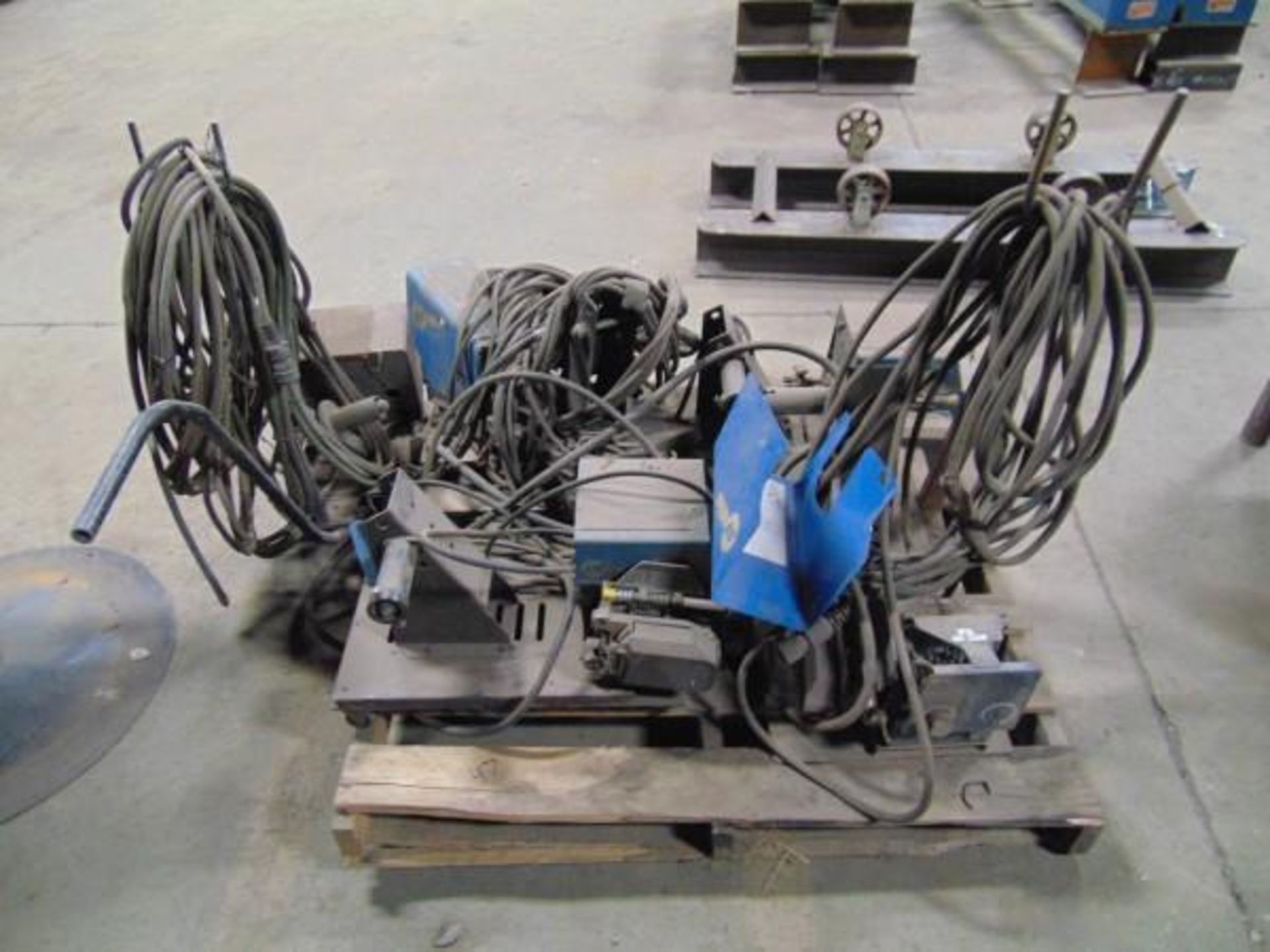 (1) Pallet of Wire Feeders, (4-miller wire feeders, 1-thermal arc wire feeder) (for parts only),