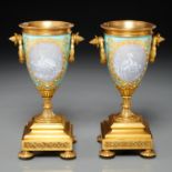 Sevres style bronze mounted pate-sur-pate urns