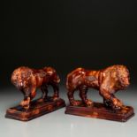 Pair Rockingham Pottery standing lions