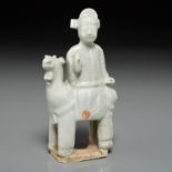 Old Chinese figure of boy atop llama