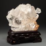 Large Chinese carved quartz dragon on stand