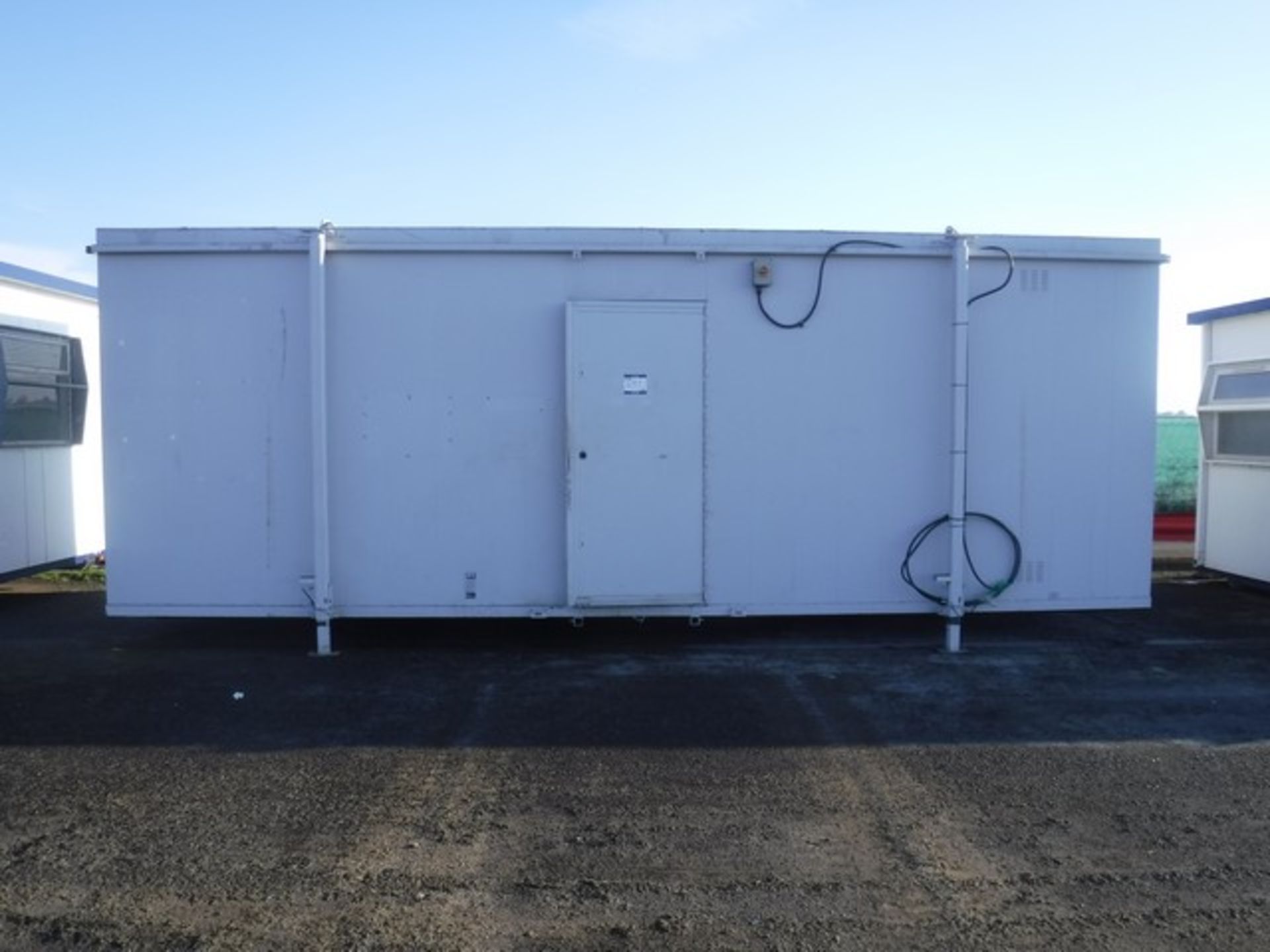 THURSTON 24' x 10' anti-vandal canteen cabin c/w water heater, sink, worktop S/N M35404. Keys in off