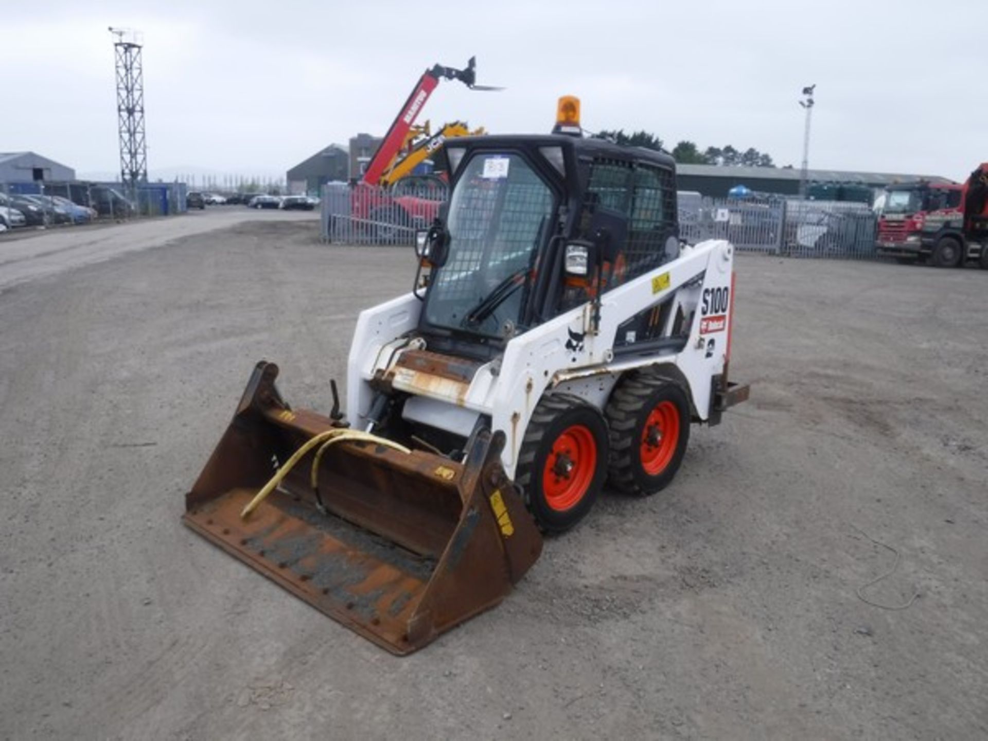 BOBCAT S100 c/w one bucket 82hrs. S/N A8ET20652. *NO KEYS*