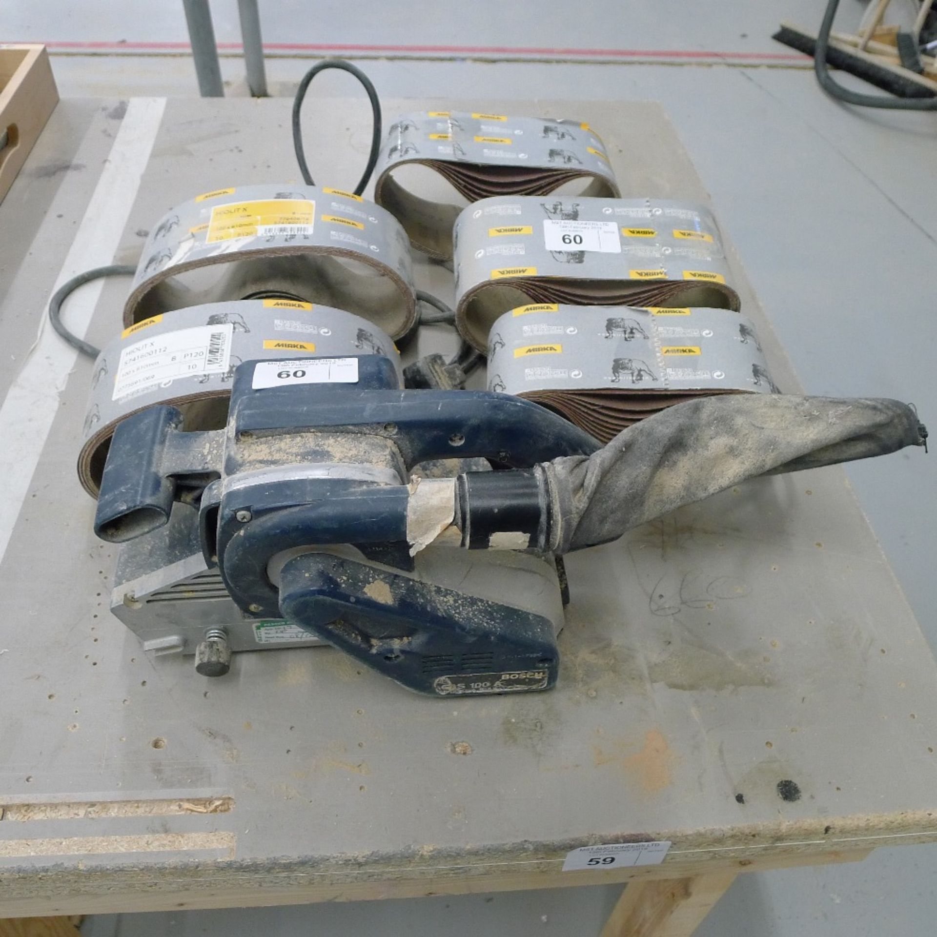 1 belt sander by Bosch type GBS 100A, 240v and a quantity of Mirka sanding belts