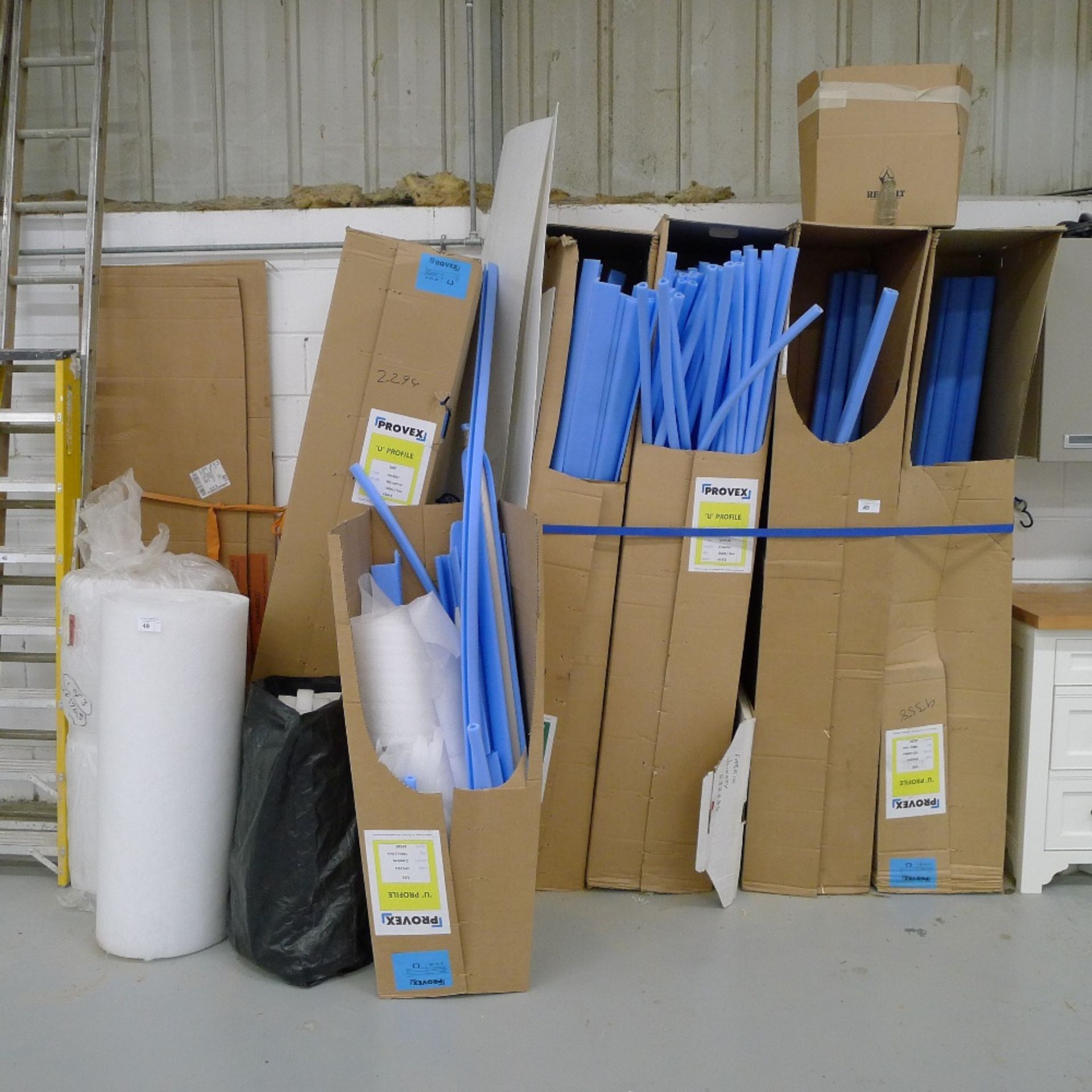 A quantity of various packaging materials, edge protectors etc