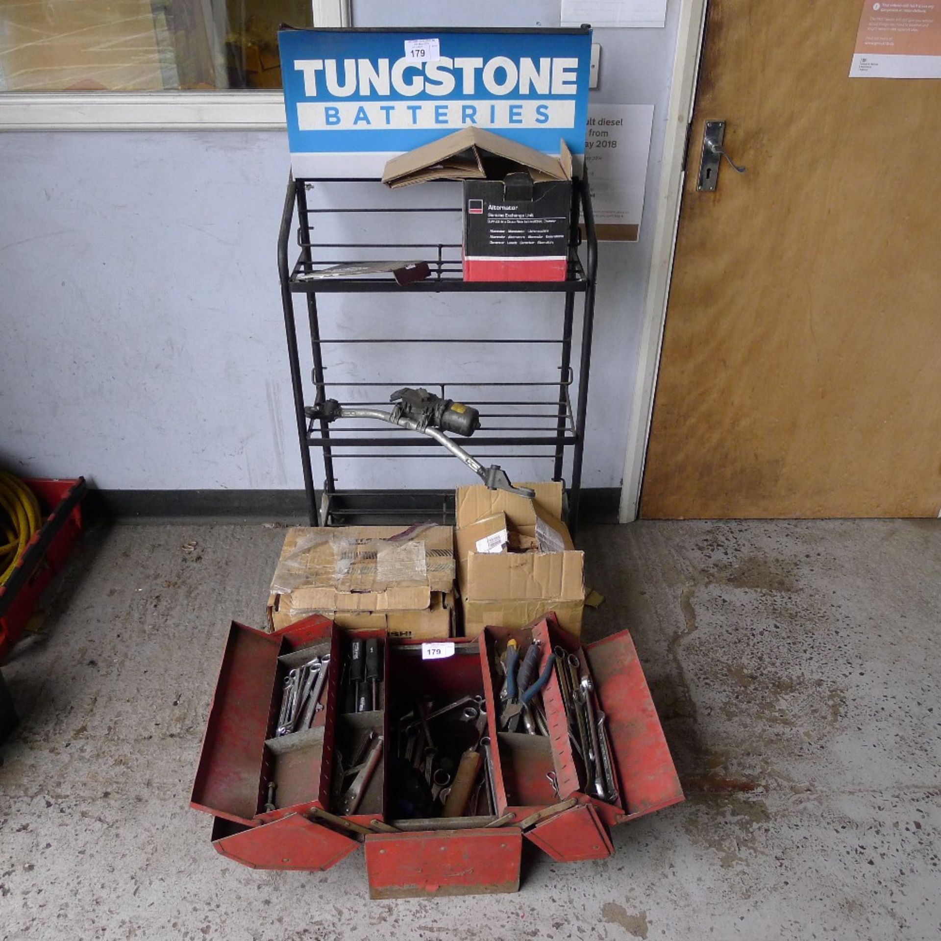 1 small red metal folding top tool box by Blue Point type KRW48A, 1 battery display rack and a small