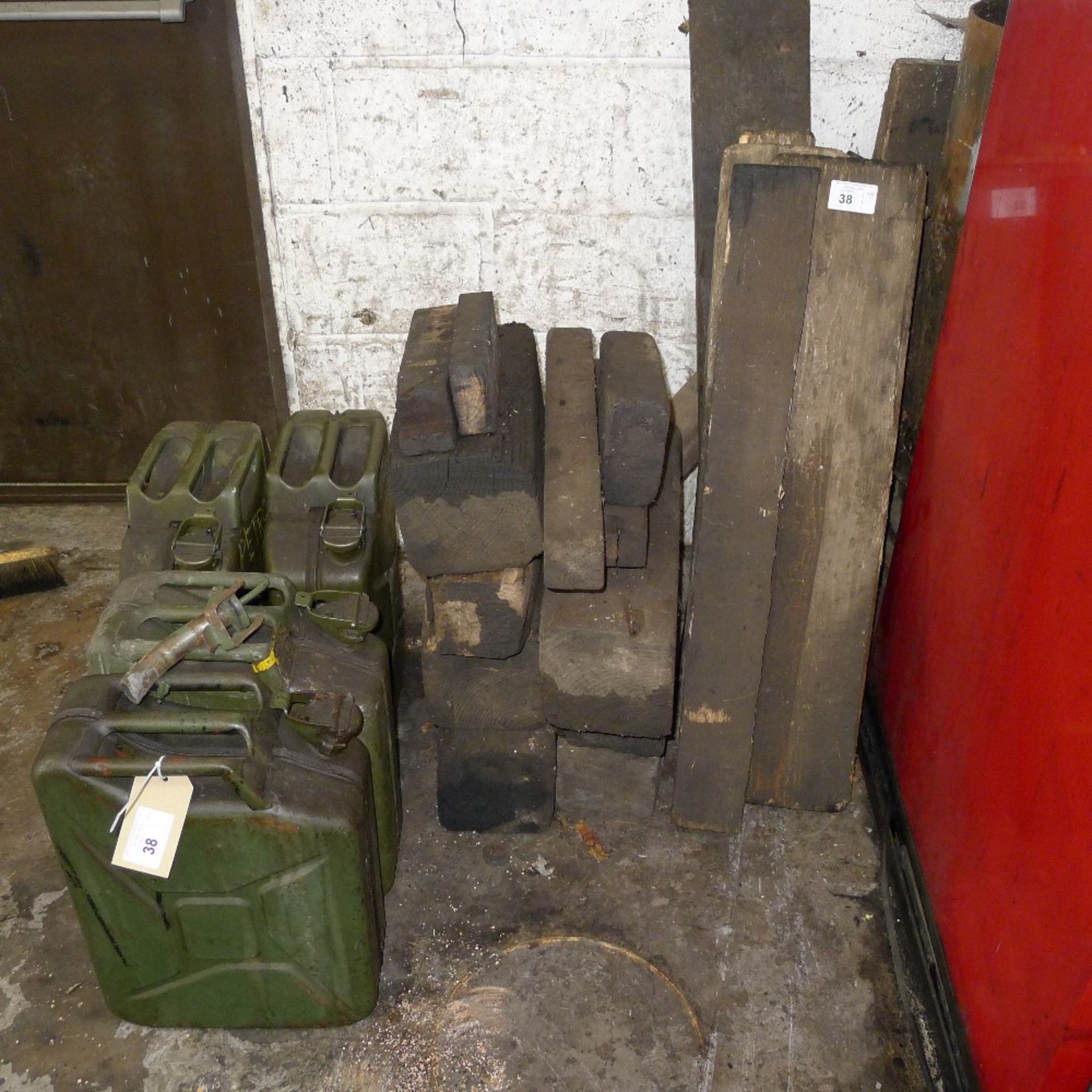 4 Jerry cans, 1 Jerry can nozzle and various wooden blocks