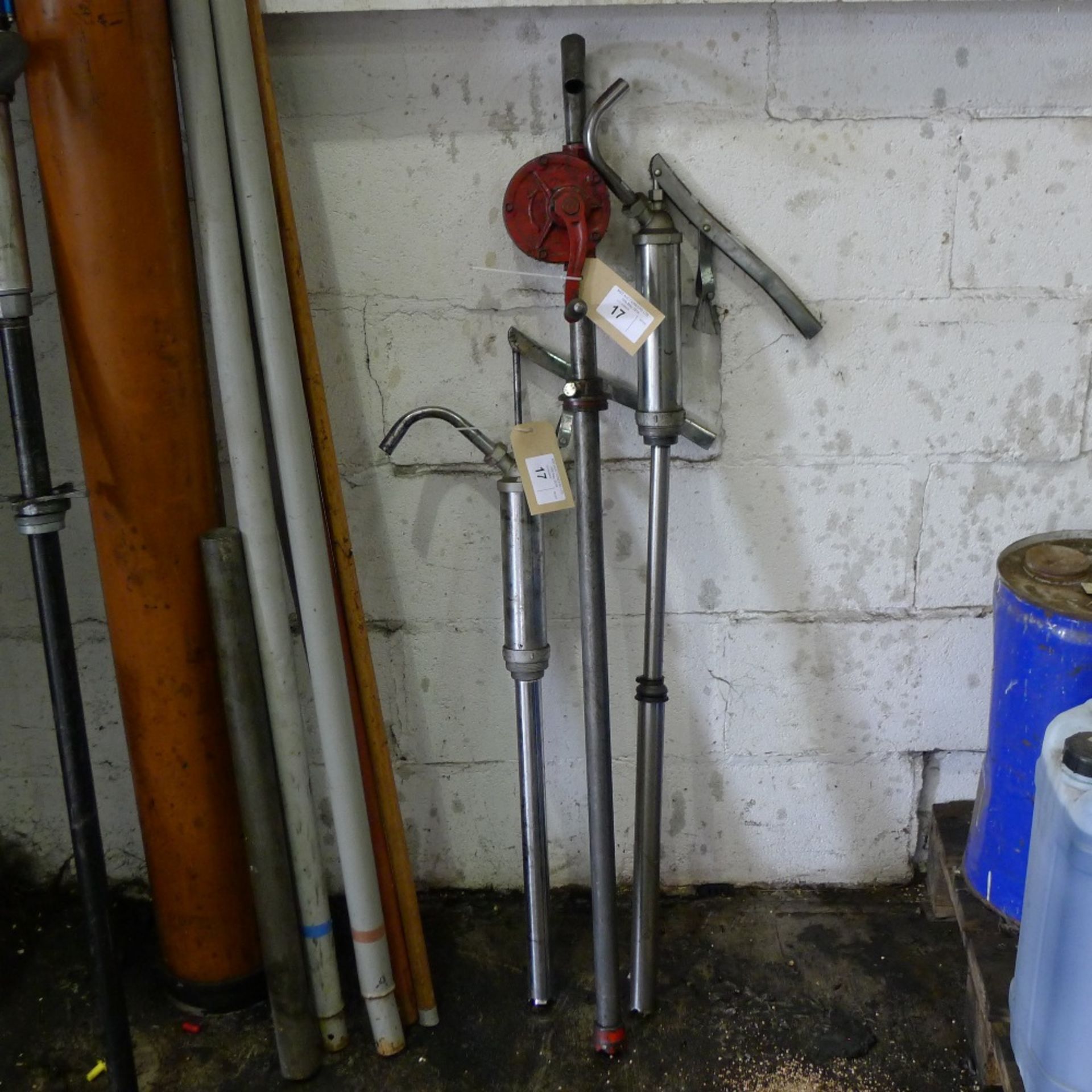 3 hand operated barrel pumps