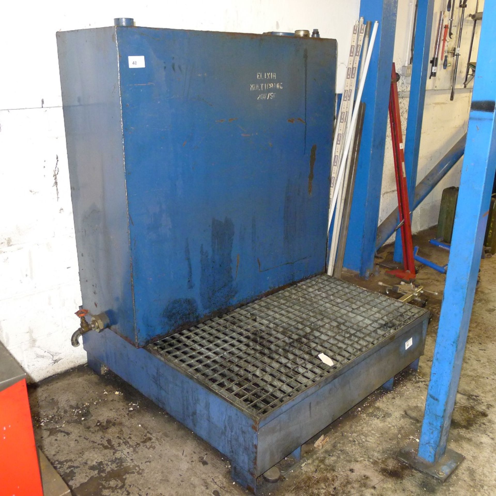 1 oil tank with grated stand – previously used for waste oil and currently empty