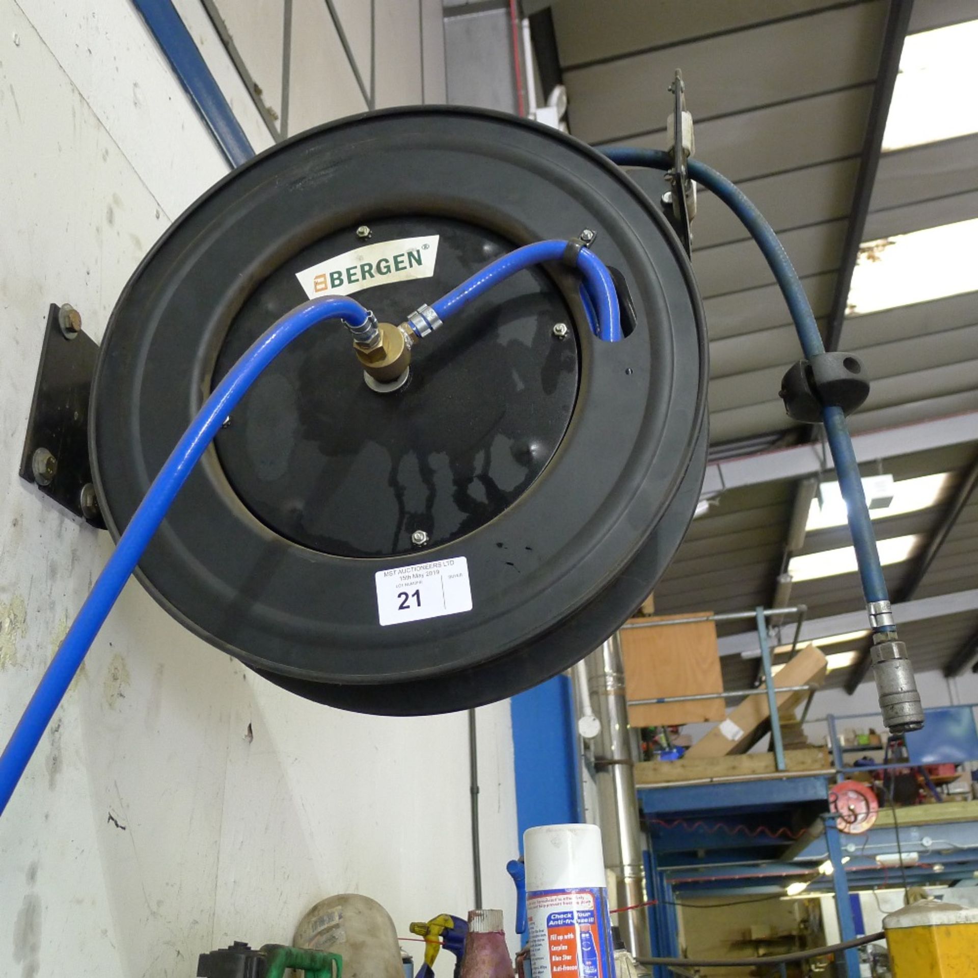 1 wall mounted retractable air hose on metal reel by Bergen